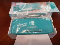 Nintendo Switch Lite [Turquoise Coca Cola Spiced] (Nintendo Switch)